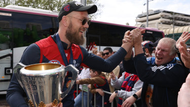 Max Gawn arrives with the premiership cup at the team celebrations the day after the grand final.
