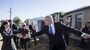 Scott Morrison and Nicolle Flint, the Liberal candidate for Boothby in Adelaide, visiting a hew housing estate to promote the Coalition's first home buyer plan.