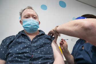 Russell Liston getting his COVID-19 vaccination at the Scope hub.