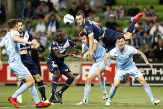 Victory’s Nick D’Agostino attempts to head the ball during the clash with Melbourne City.