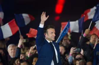 Emmanuel Macron, France’s president, waves to supporters 