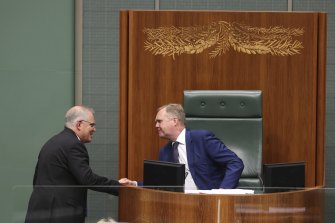 Speaker Tony Smith is congratulated by Prime Minister Scott Morrison  after announcing his intention to step down as Speaker.