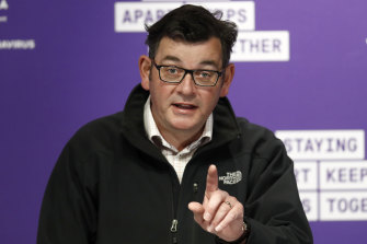 Daniel Andrews’ North Face jacket and the purple backdrop became a symbols of the Premier’s crisis leadership.