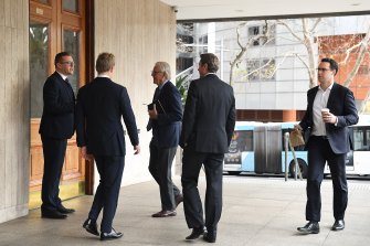 Men arrive at the men’s only Australian Club which is holding a vote to determine if women can become permanent members.