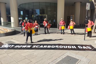 A protest was held outside the Woodside building in Perth on November 25, calling for the end of the Scarborough gas project. 