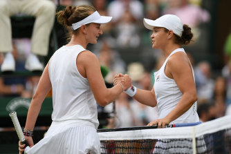 Barbora Krejcikova and Ash Barty shake hands at the net after their fourth-round match.