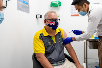 Prime Minister Scott Morrison receives the COVID-19 vaccine on Sunday.