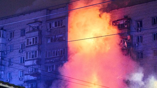 The fire rages after a Russian missile hit a multi-story residential building in Vyshgorod, outside Kyiv, Ukraine, early Sunday, Nov. 30, 2025. (AP Photo/Efrem Lukatsky)