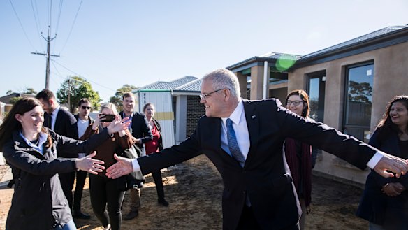 Scott Morrison and Nicolle Flint, the Liberal candidate for Boothby in Adelaide, visiting a hew housing estate to promote the Coalition's first home buyer plan.