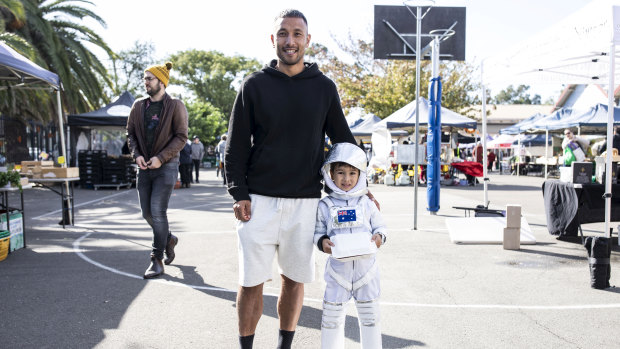 Tony Ly, pictured with son Chet, said the "essence" of the Orange Grove Market in Lilyfield remained despite COVID-19 restrictions.