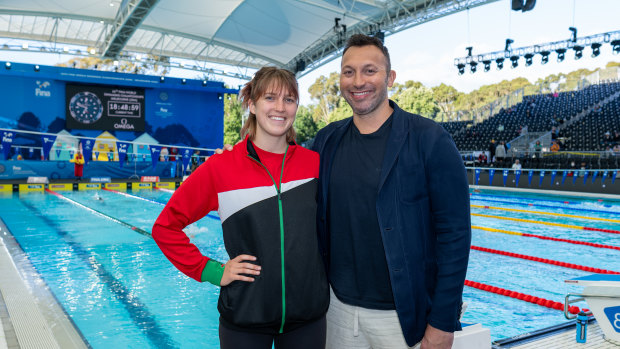 Imara-Bella Thorpe meets Ian Thorpe at the Melbourne Sports and Aquatic Centre during the World Shortcourse Championships.