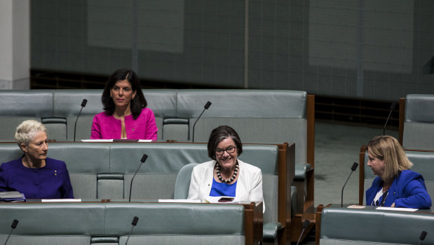 Cathy McGowan MP [C] is surrounded by Dr Kerryn Phelps MP, Julia Banks MP and Rebekha Sharkie MP in the House of Representatives at Parliament House in Canberra. 