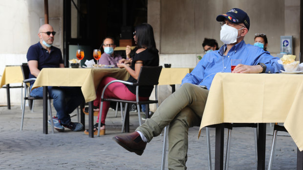 Residents enjoy the ritual of the outdoor aperitif in the bars of the city after more than two months of lockdown in Rome, Italy.