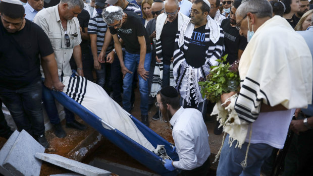 Mourners at the funeral of Yigal Yehoshua in Hadid. 