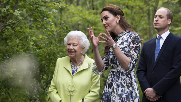 Queen Elizabeth II with the Duchess of Cambridge and Prince William.