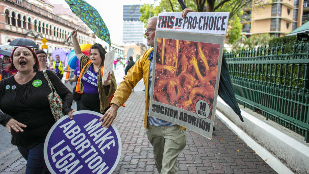 Activists from both sides of the abortion debate protest outside Queensland Parliament in 2018.  