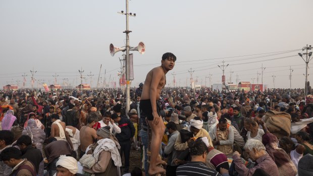 Indian Hindu pilgrims gather at Sangam, the confluence of the rivers Ganges, Yamuna and mythical Saraswati, during the Kumbh Mela festival on Monday.