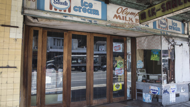 The rundown exterior of the Olympia milk bar.
