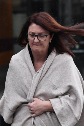 Nicole Smith, former chair of NAB's superannuation trustee Nulis,  leaves the royal commission hearing on August 8.
