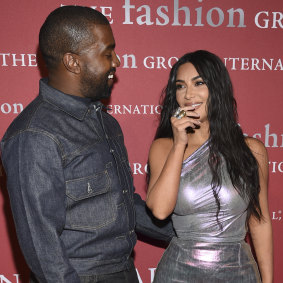 Kim Kardashian and her husband Kanye West at a fashion gala in late 2019. She wears shapewear all the time, not to events such as this.