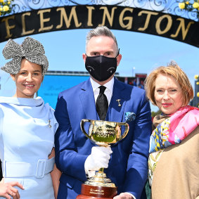 VRC chairman Neil Wilson, pictured with Michelle Payne and trainer Gai Waterhouse, says it was vital for Melbourne to open up for the Cup.