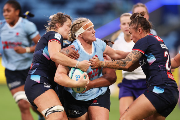 Emily Robinson carting the ball up for the Waratahs.