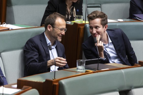 Greens leader Adam Bandt and spokesperson for housing and homelessness Max Chandler-Mather in parliament on Monday.
