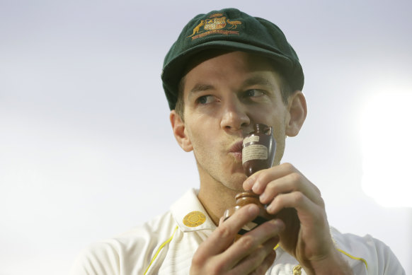 Kiss this: Tim Paine with the Ashes urn. 