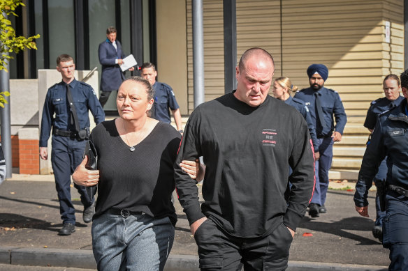 Hannah McGuire’s parents, Debbie and Glenn McGuire, leave court.