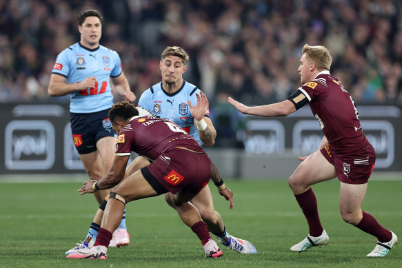 Zac Lomax takes on the Maroons at the MCG.