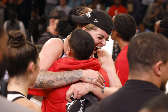 Cayla George celebrates her WNBA championship win with the Las Vegas Aces on Thursday.