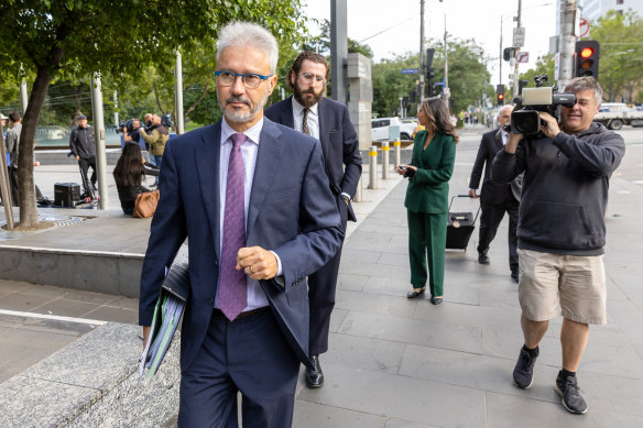 Maurice Blackburn lawyer Josh Bornstein (left) leaves the Federal Court where he was representing Sally Rugg in her dispute with independent MP Monique Ryan.