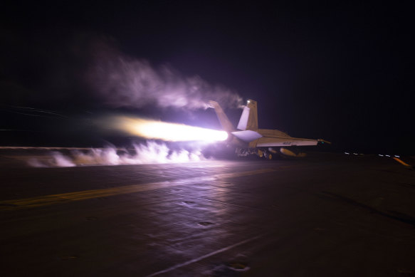 An aircraft launching from USS Dwight D. Eisenhower (CVN 69) during flight operations in the Red Sea in January.