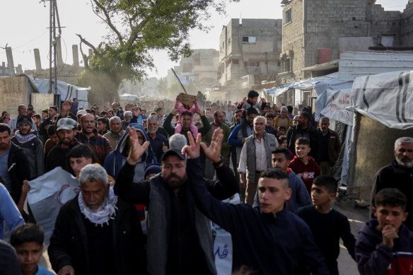 Palestinians attend a rally calling for an end to the war, in Beit Lahiya, in the northern Gaza Strip.