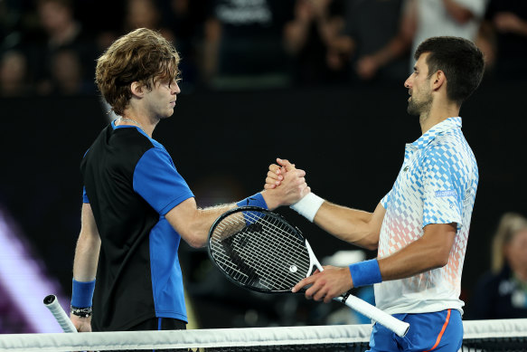 Andrey Rublev and Novak Djokovic after the match.