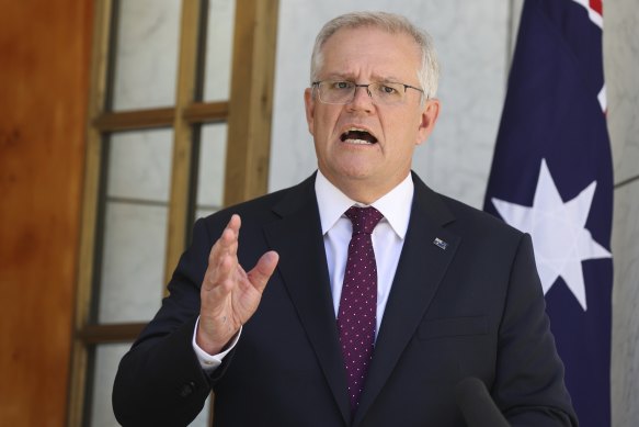Prime Minister Scott Morrison outlines the new rules at a press conference at Parliament House. 