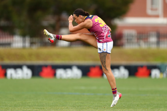 Brisbane’s Jesse Wardlaw kicks a goal. 