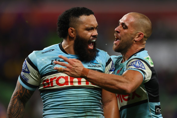 Siosifa Talakai celebrates his try against the Storm.