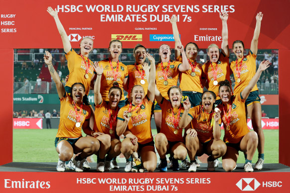 Australian players after winning the Dubai Sevens.