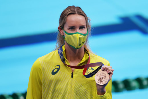 Emma McKeon celebrates her bronze medal.