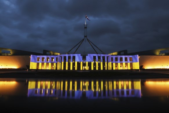 Landmarks around the world were lit up in Ukrainian colours, blue and yellow, including Parliament House in Canberra.