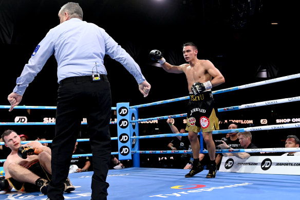 Tim Tszyu knocks down Jeff Horn during the WBO Global & IBF Australasian Super Welterweight title bout.