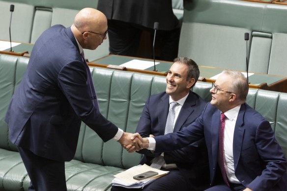 Peter Dutton shakes hands with Anthony Albanese to congratulate him.