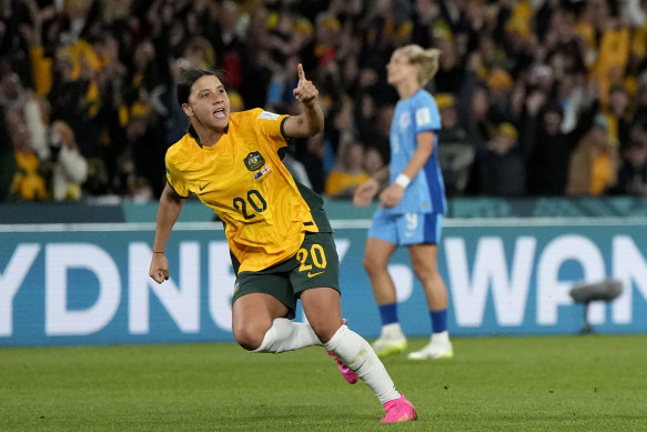 Sam Kerr celebrates after scoring the Matildas’ first goal during the Women’s World Cup semifinal between Australia and England at Stadium Australia in Sydney on August 16, 2023. 