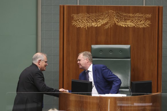 Speaker Tony Smith is congratulated by Prime Minister Scott Morrison  after announcing his intention to step down as Speaker.
