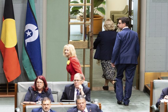 Shadow Assistant Minister for Manufacturing Michelle Landry (in navy jacket) exiting the chamber during question time.