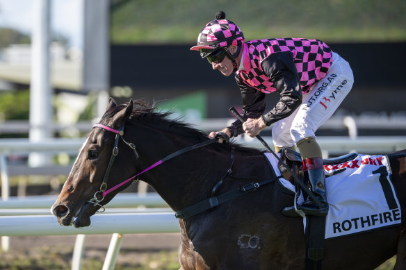 From humble beginnings: Jockey Jim Byrne rides Rothfire to victory at Eagle Farm. 