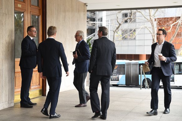 Men arrive at the men’s only Australian Club which is holding a vote to determine if women can become permanent members.