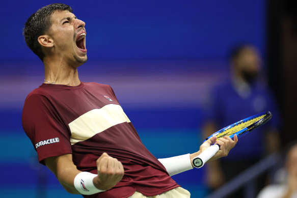 Alexei Popyrin of Australia reacts after breaking serve against Novak Djokovic.