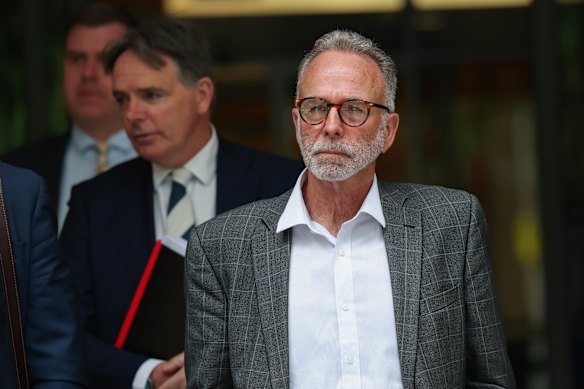 William Swale leaves the Coroners Court with his lawyers on Tuesday.